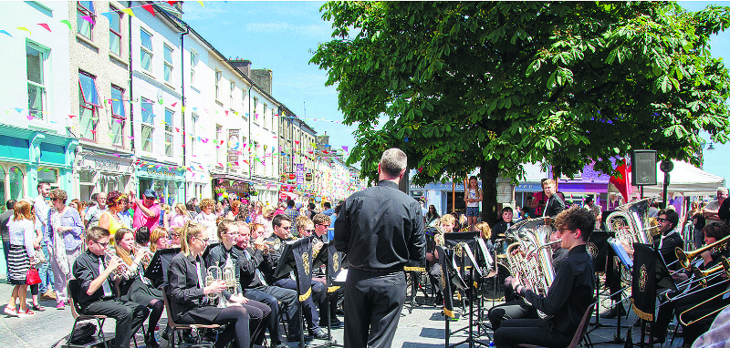 Ger Condon conducts the Clonakilty Brass Band, which entertained a huge appreciative audience at the last Saturday’s Clonakilty Street Carnival. The band will compete in the senior category of the Clonakilty South of Ireland championships on Saturday, July 1st next, when 32 bands from all over the country will be in attendance.(Photo: George Maguire)